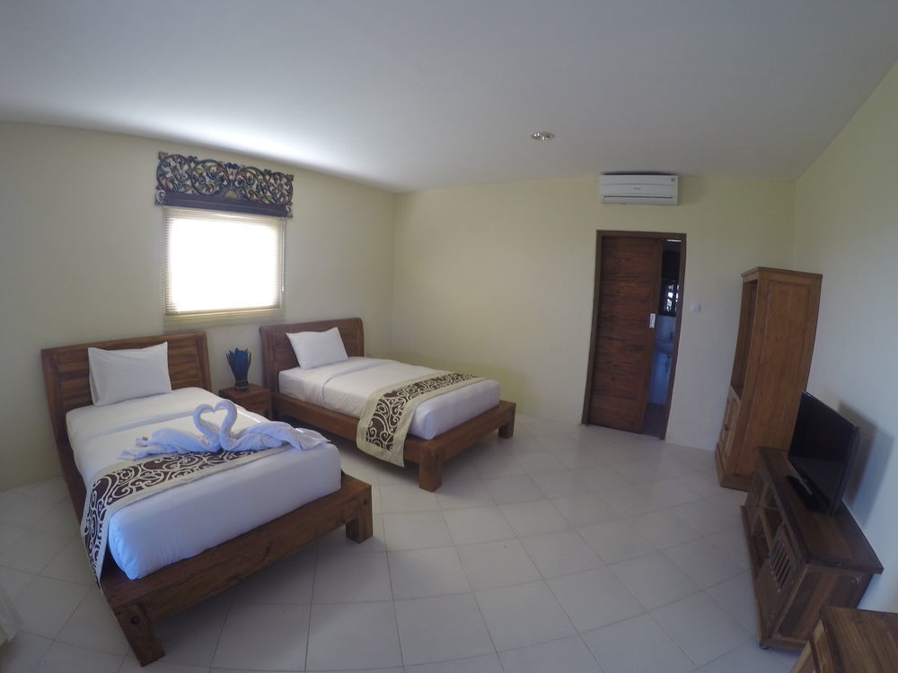 Arton Resort & Beach Club Pulukan Exterior photo